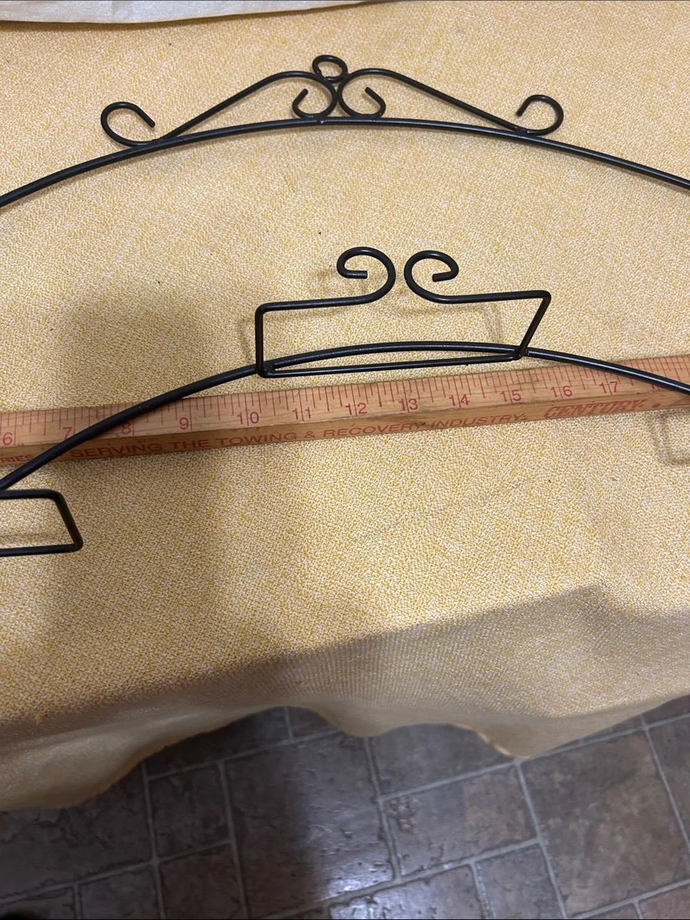 Black Decorative Metal Wall Plate Rack - Elegant Curved Scroll Design